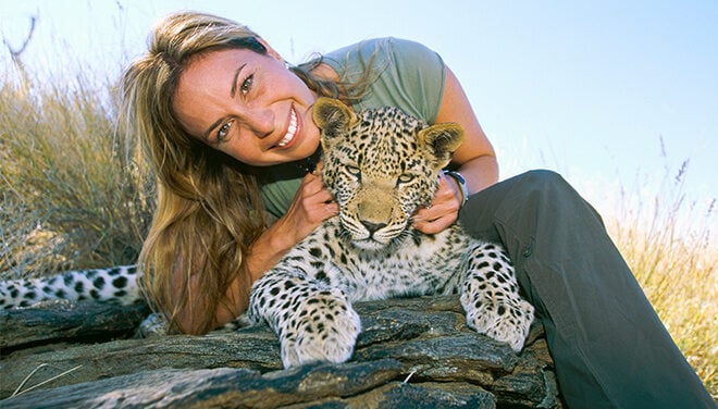 Mireya Mayor poses with a leopard