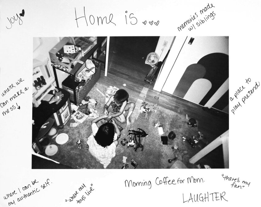 Black and white photo of kids playing in a living room with hardwritten notes in the margins about what home is.