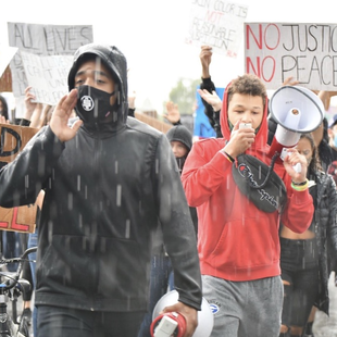 young leaders march during a Black Lives Matter protest