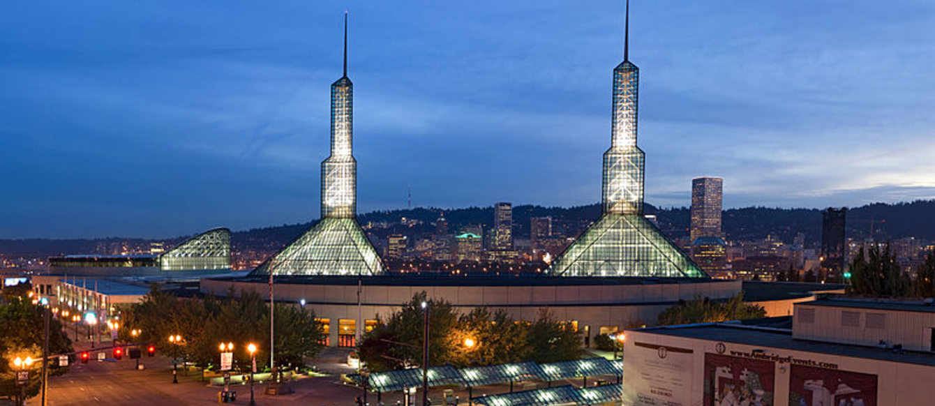 photo of the Oregon Convention Center towers at night