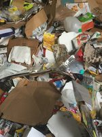 pile of commingled plastic and paper recycling