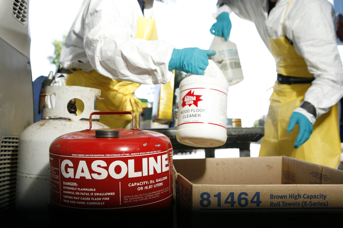 photo of a gas can and other flammable liquids