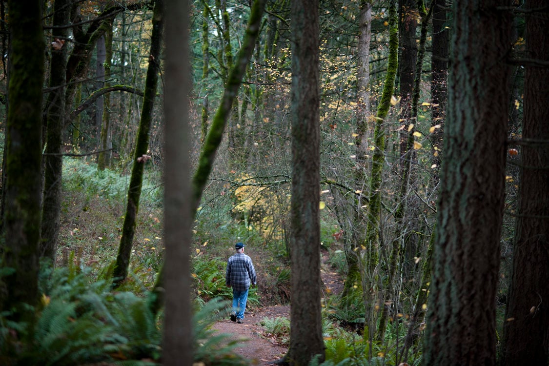 photo of a man hiking at Mount Talbert