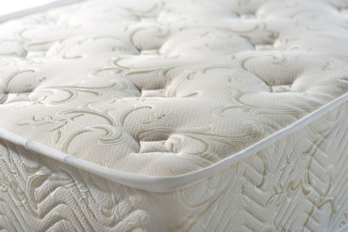 angled view of a padded mattress