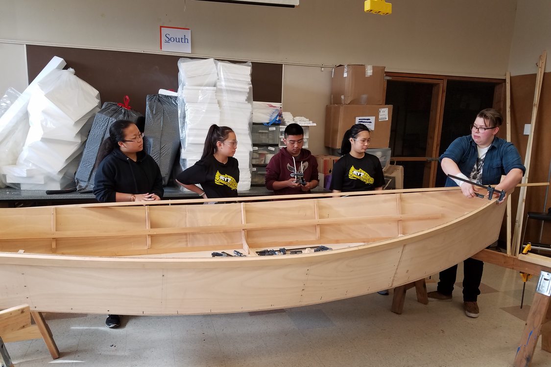 photo of George Middle School students building boat