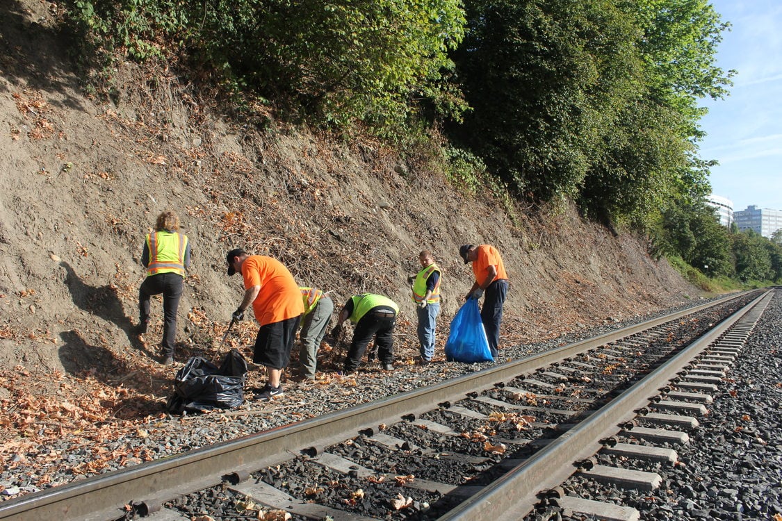 Photo of RID Patrol and cleanup crews along the railroad