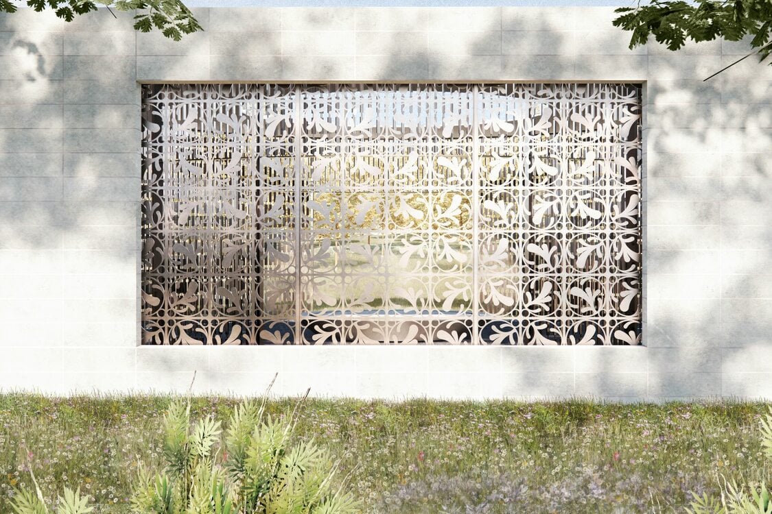 drawing of a stone wall, dappled by the shade of trees, with a large metal screen in the middle of the wall in a traditional Chinese design